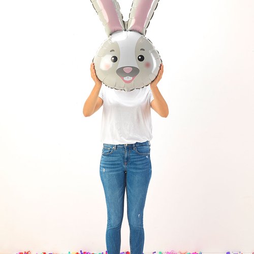 Person holding a 94 cm foil balloon bunny head, perfect for parties, available for air or helium inflation.