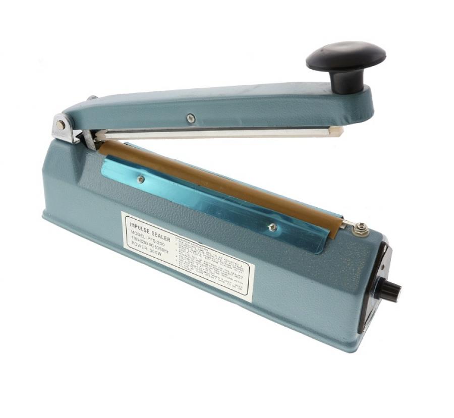 Professional 220V impulse heat sealer sealing a foil balloon edge
